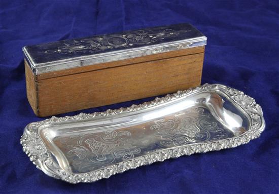 A late 19th century plated snuffers stand, 8.75in and a silver plated toilet box lid,